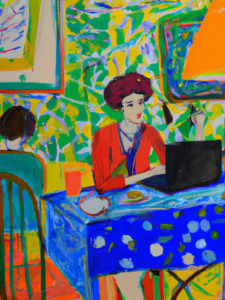 Dame mit Laptop an einem Tisch im Café sitzend